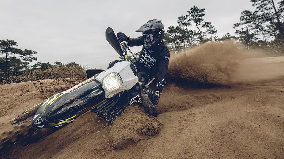 Triumph TF 450-E riding shot close to the ground